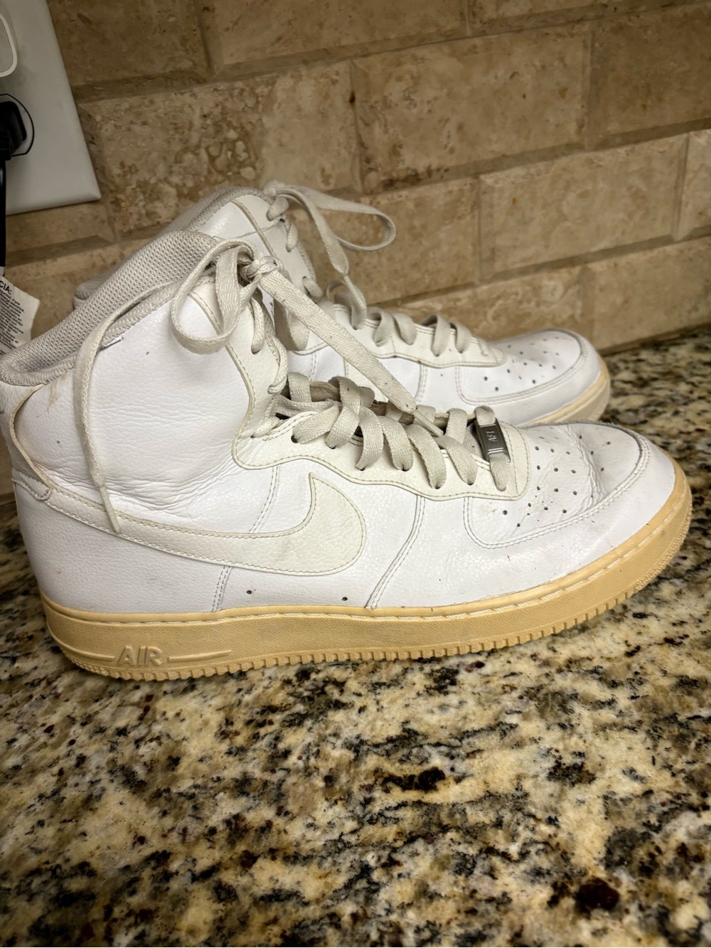 Nike White High-Top Sneakers with Cream Sole